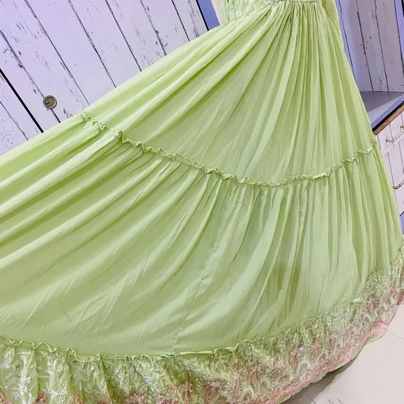 Full flaired beautifully embroidered pastel green gown for party wear - Picture 7 of 11